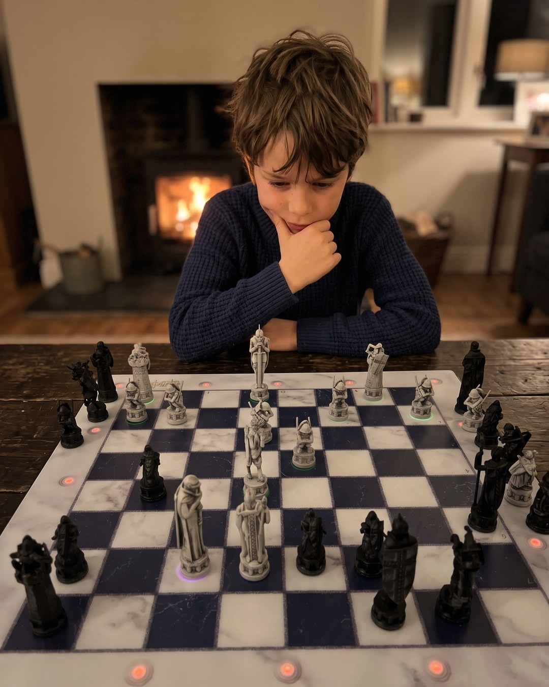 Boy · fireplace · thinking